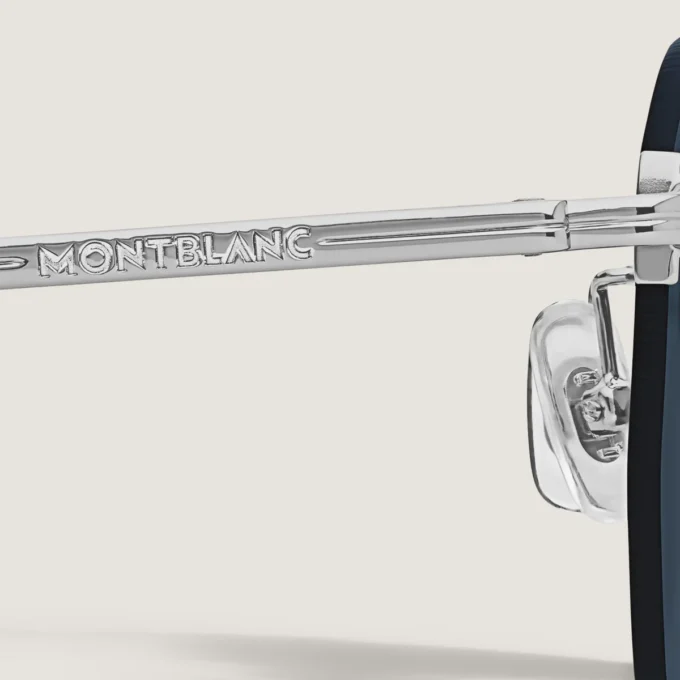 Gafas de sol redondas con montura metálica plateada